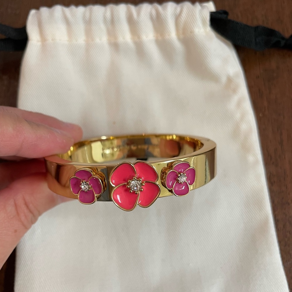 Kate Spade gold bangle with floral detail